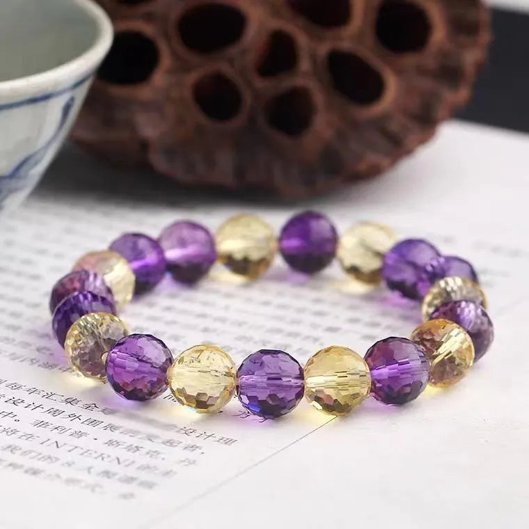 Handmade unisex bracelet with 128-faceted crystal beads and a decorative charm, available in multiple bead sizes.
