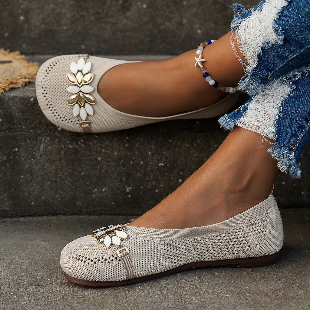 Women's round toe flat shoes with floral metal decoration, mesh upper, flat heel, available in beige, black, and blue