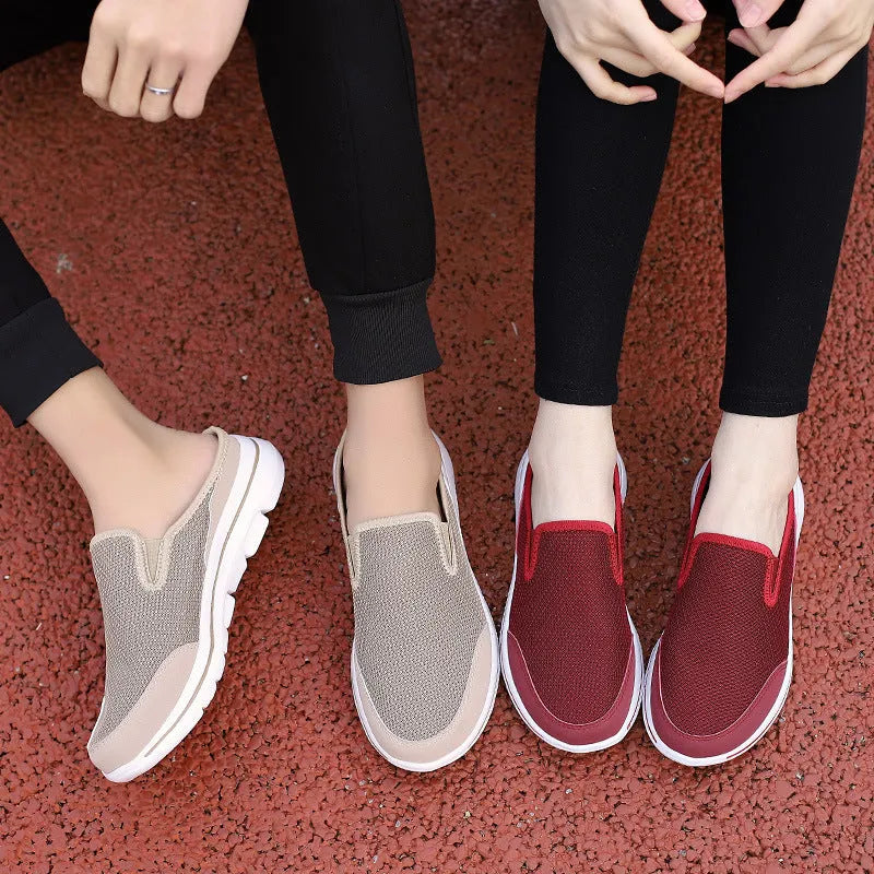 Breathable mesh toe holder slippers in solid colours on a flat heel sole.