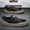 British round toe men's microfiber leather lace-up shoes in black, showing sewing line detail and rubber sole.