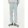 Light blue straight loose jeans with paint splash and washed finish, mid-waist zip fly, laid flat on neutral background