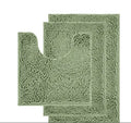 Chenille U-shaped three-piece bathroom carpet set in green beside a toilet.