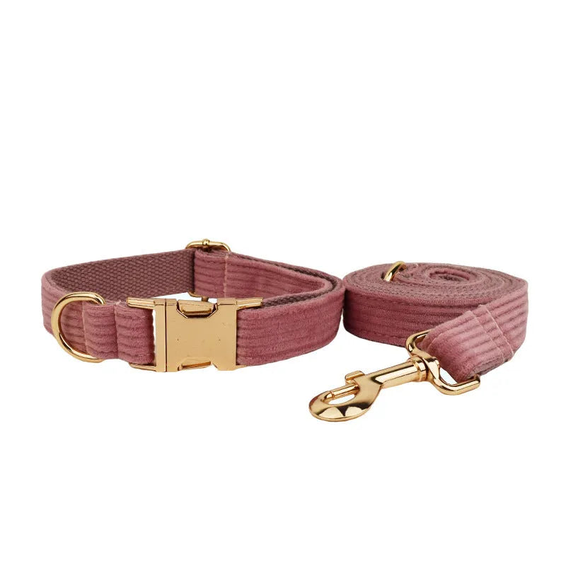 Corduroy dog collar and leash five-piece set with vest, bow, and poop bag in red.