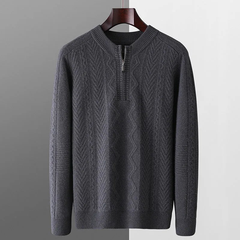 Man wearing a beige pure wool sweater with a diamond pattern and a half-zip front.