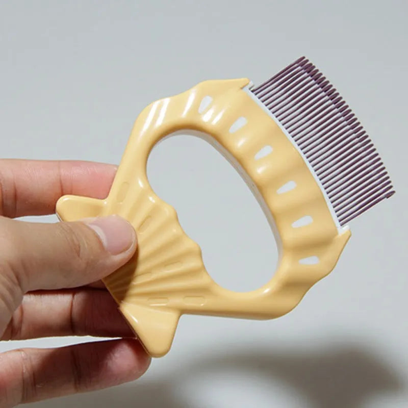 Shell-shaped pet grooming brush with coloured handle and wire bristles for dog and cat hair removal