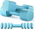 A set of pink detachable plastic dumbbells for women's fitness on a grey background.