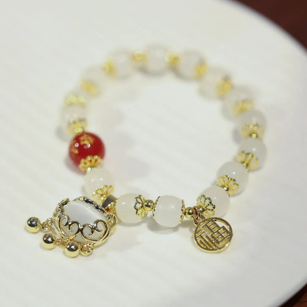 Women's Chinese-style coloured glaze bracelet with fugui safety lock and windmill glass charms