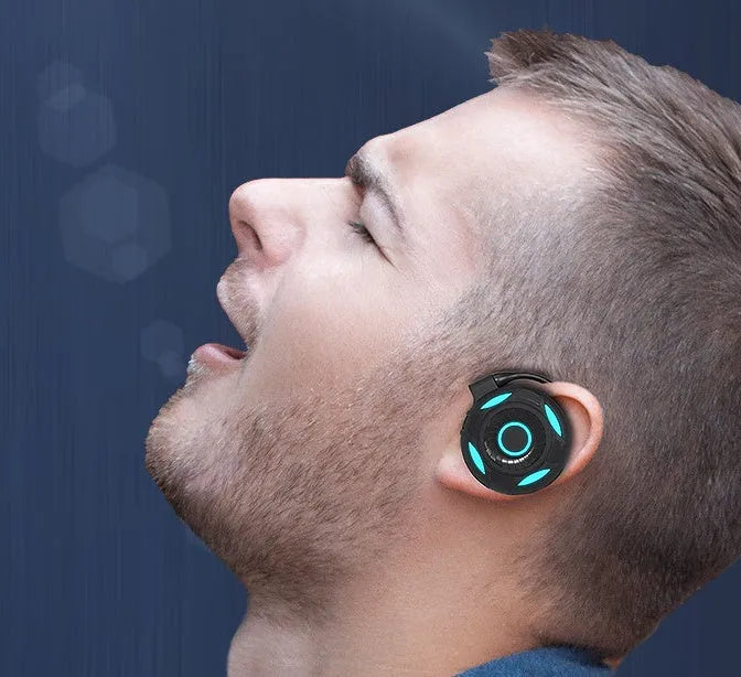 Black and white Bluetooth earphones with hanging ear design for gaming and music