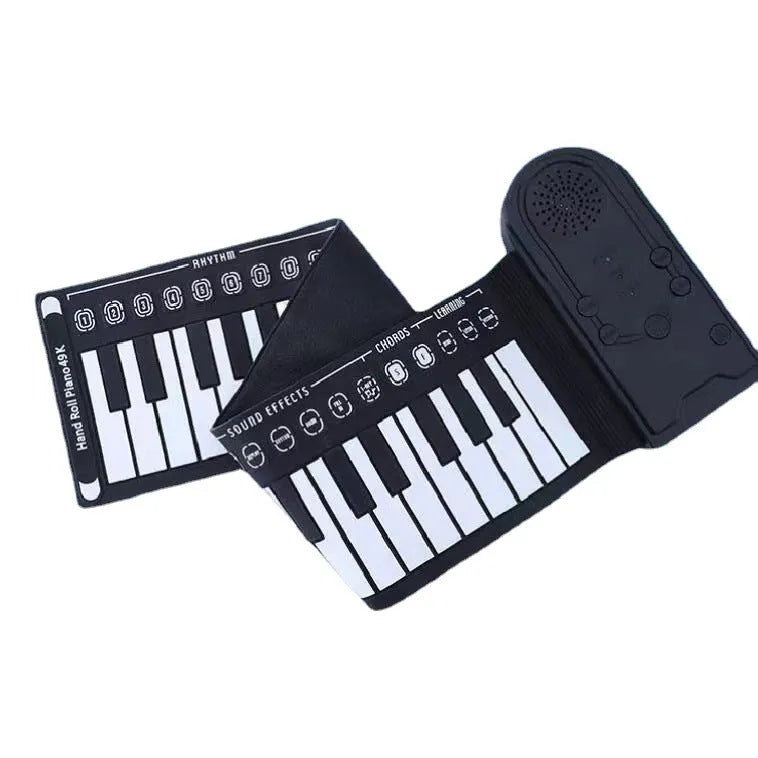 Rolled-up silicone keyboard next to its ABS control panel, packed inside a 28cm black carry case.