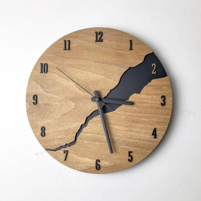 Modern wooden wall clock with a creative crack style design on its face.
