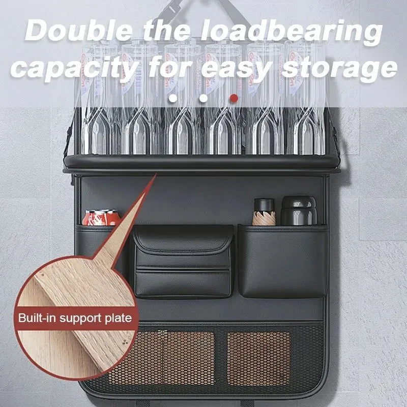Black PU leather car seat storage bag with foldable table tray attached to a car back seat