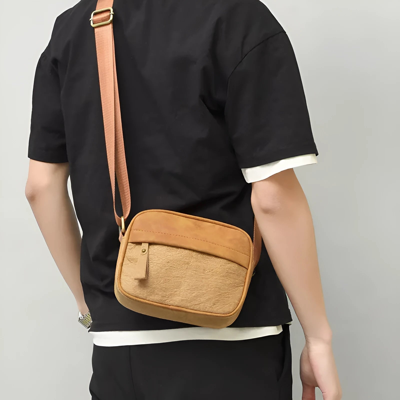 Men's waterproof paper crossbody bag in European retro style available in black, brown, and silver