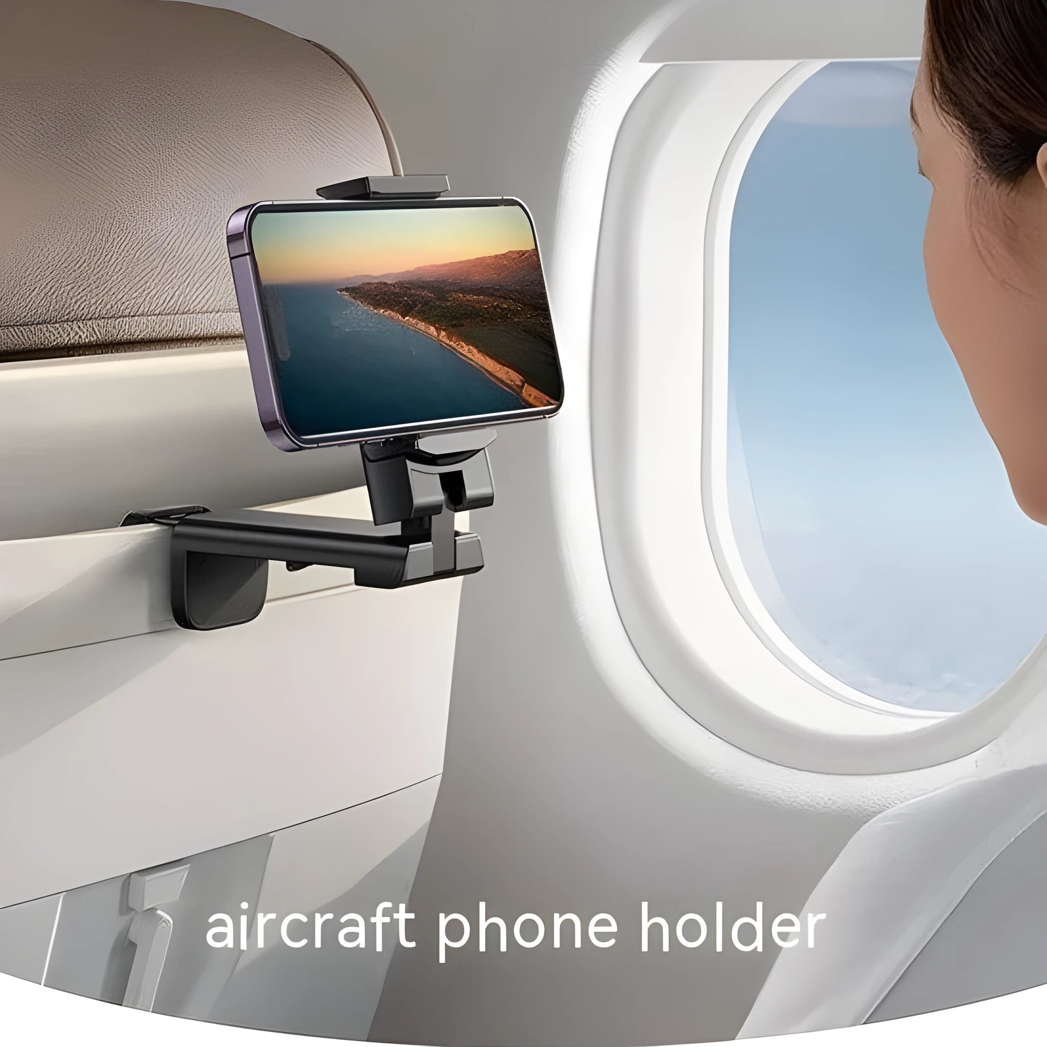 A black foldable rotating lazy phone holder gripping a mobile smartphone on a desk.