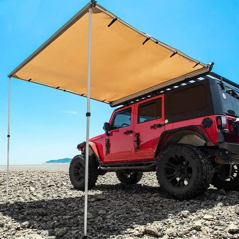 Black glue waterproof two-bedroom camping tent with aluminium poles set up outdoors.