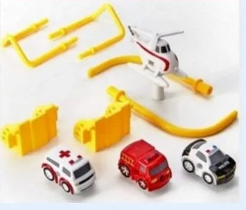 Big Adventure plastic toy set with multi-level parking garage, car tracks, and toy vehicles laid out for play.