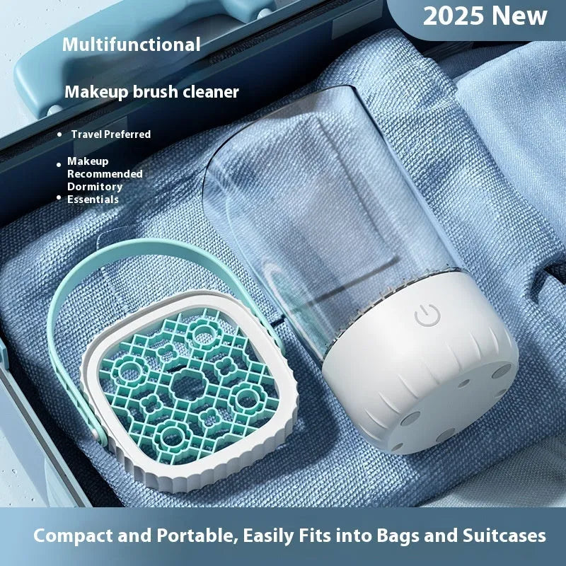 White rechargeable electric makeup brush cleaning device with USB cable.