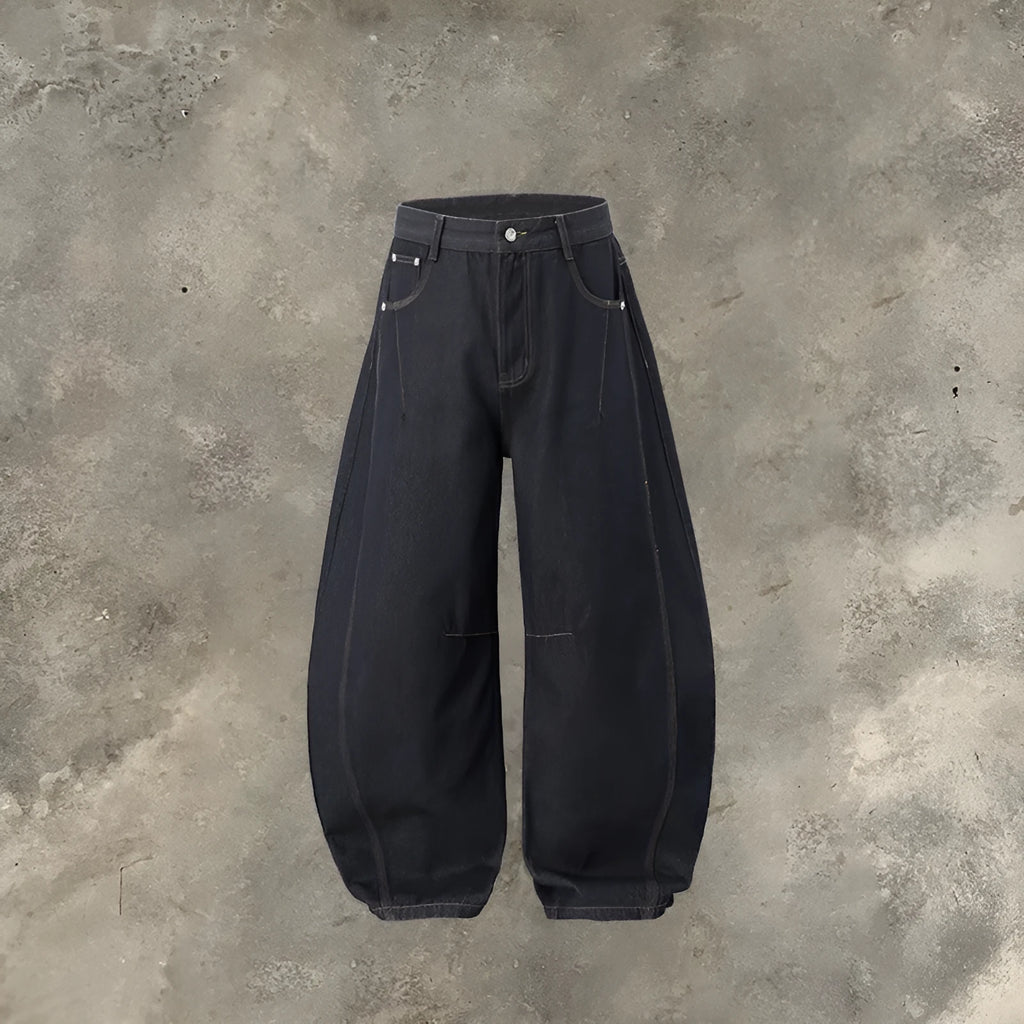 Men's wide leg denim trousers in original cow colour showing mid waist design and relaxed fit