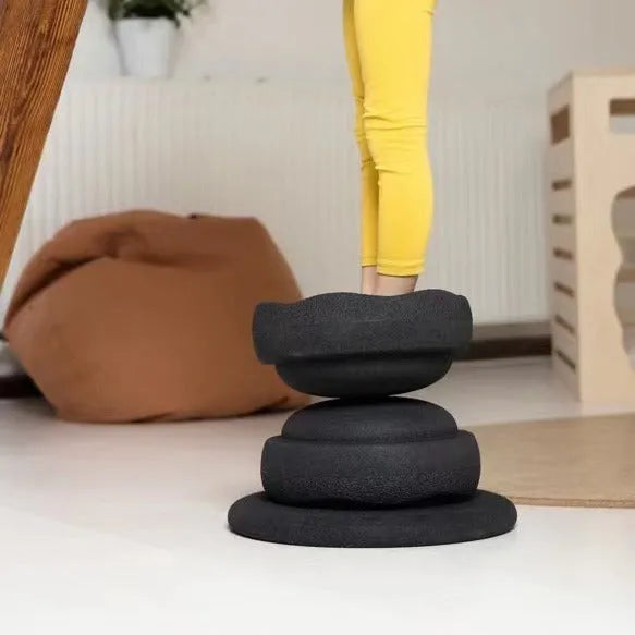 Plastic wood surf balance board for children in mixed colour or black finish.