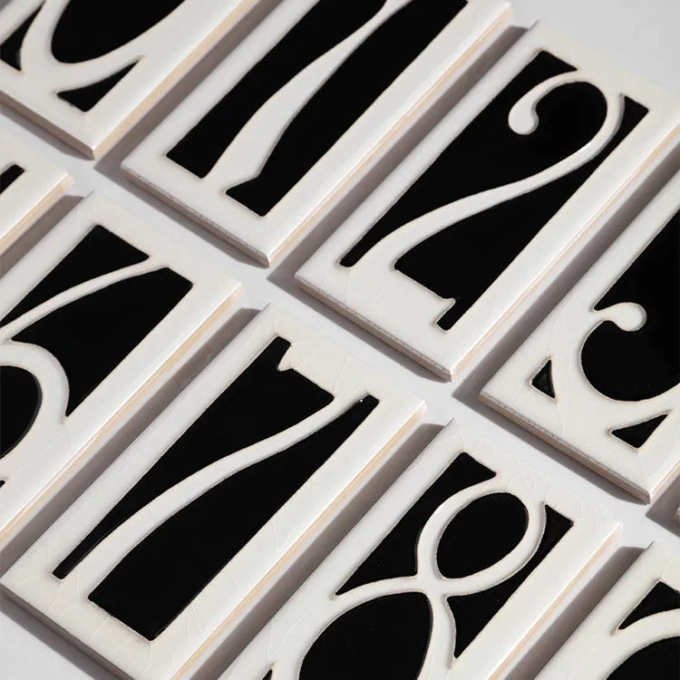 Handmade retro-style ceramic doorplate with a large, white vitreous enamel number 5 on a blue background.