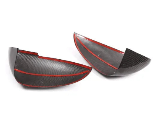 Pair of real carbon fibre rearview mirror covers for Porsche Macan, showing black woven texture.