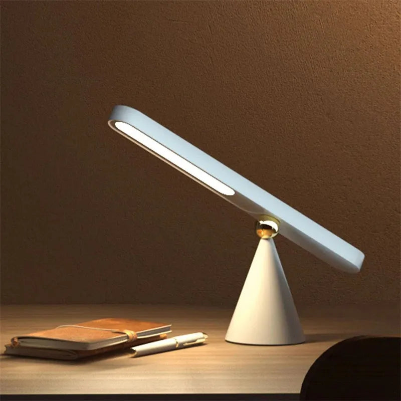 Geometric design desk lamp with magnetic base for wall mounting in white or khaki colour
