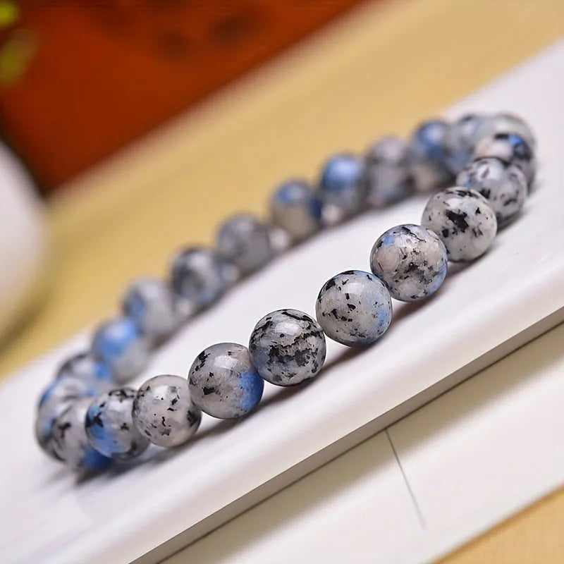 Handmade natural K2 azurite stone beaded bracelet with geometric shape on wrist