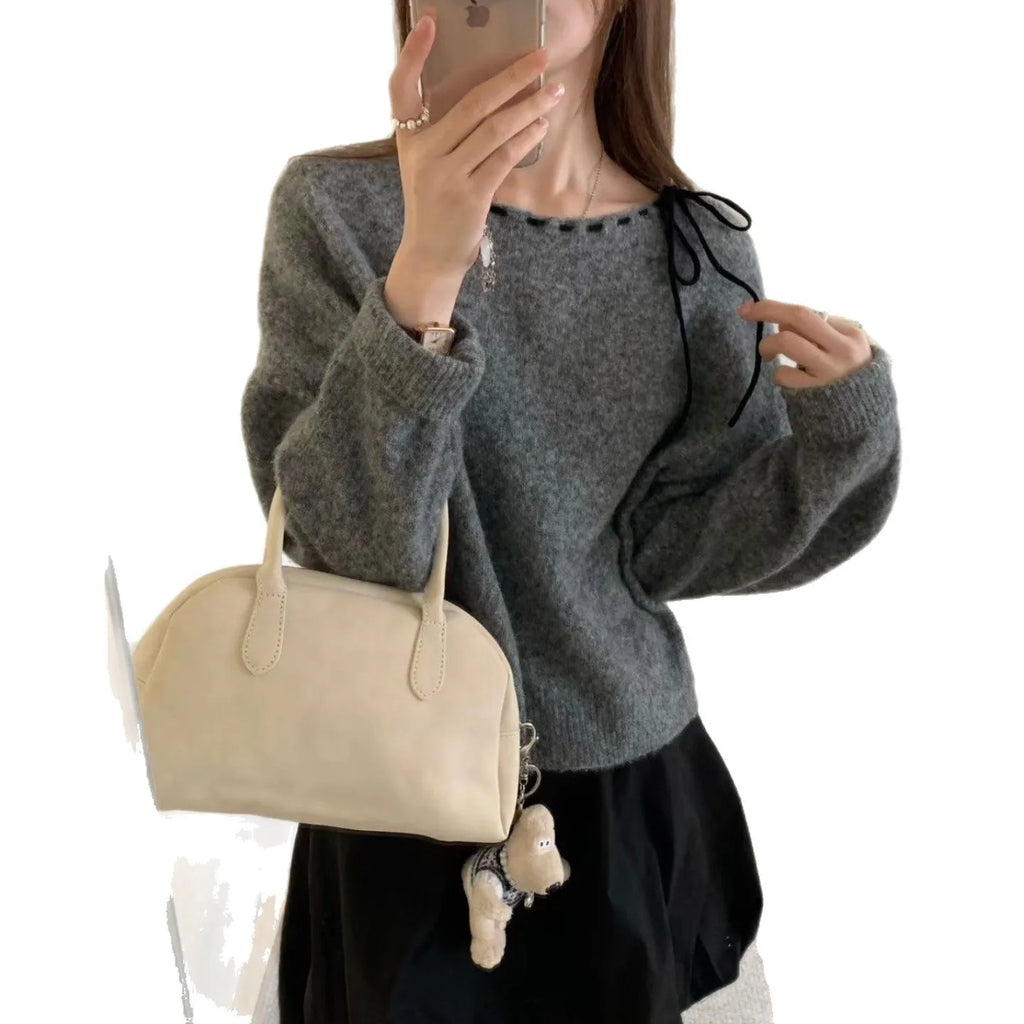 Grey loose-fitting women's pullover jumper made from regenerated cellulose fibre.