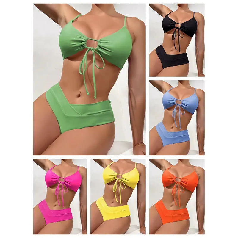 Women's orange tied bow split front bikini with briefs bottoms, shown on a mannequin.