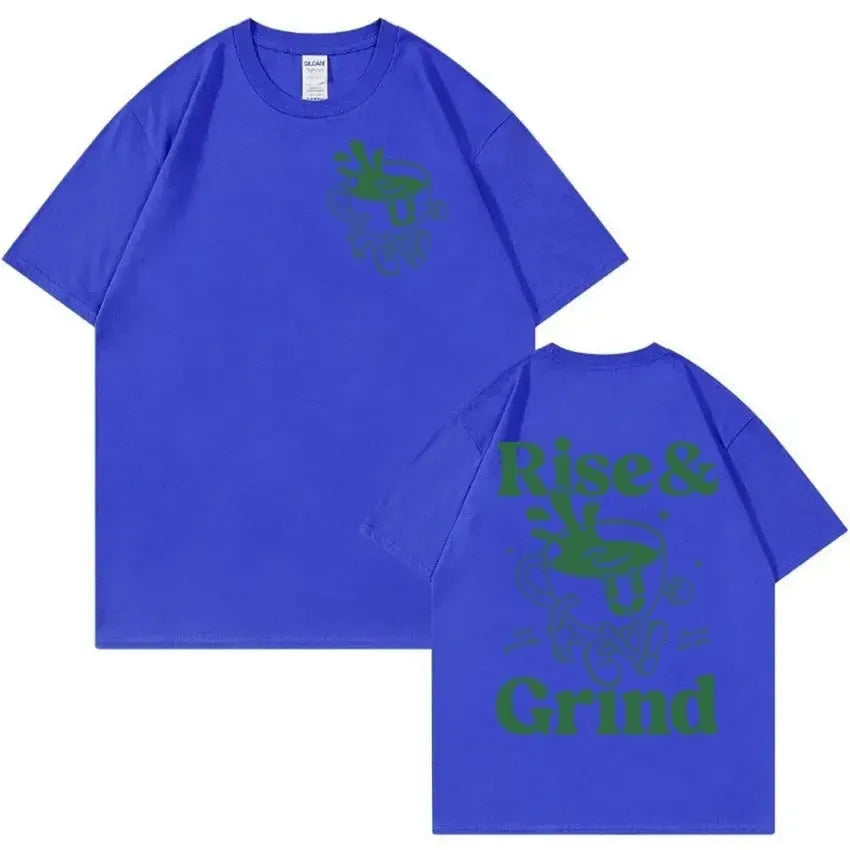 Rise And Grind Green Coffee cartoon graphic printed on a loose fit linen blend t-shirt.