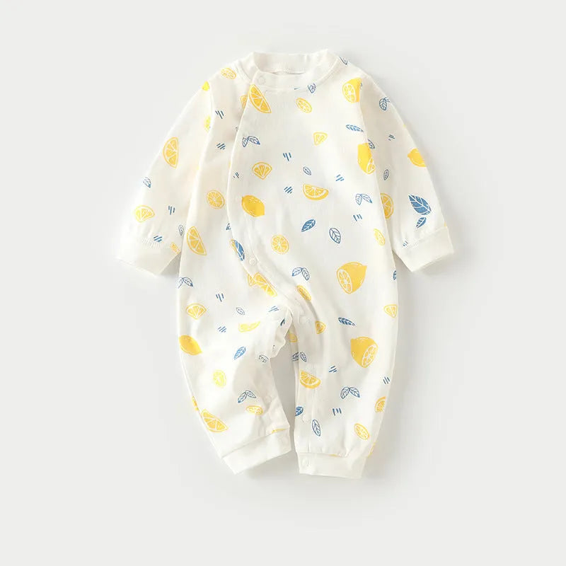 Cotton baby long climb pajamas in a colourful print, shown laid flat, suitable for spring and autumn.