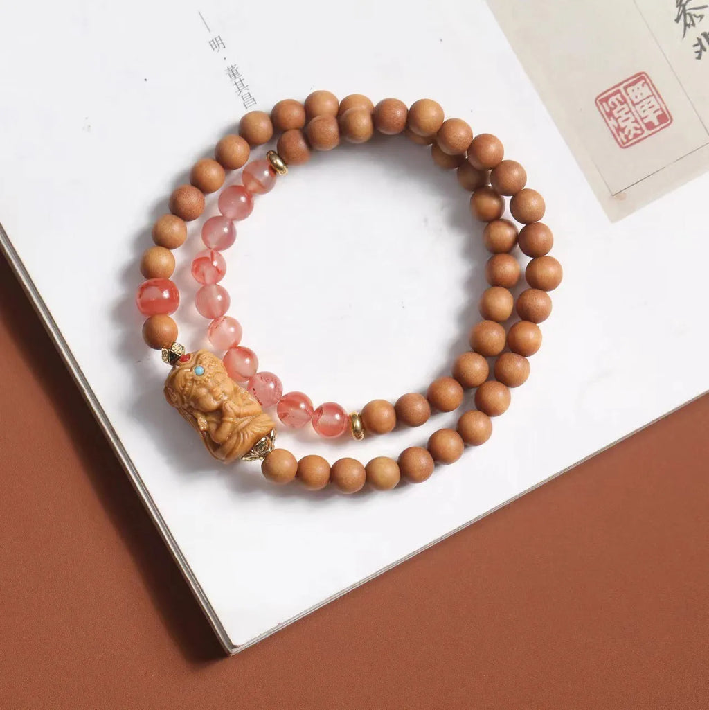 Brown wooden bracelet with South Red Zachilam double circle design showing 6mm round beads