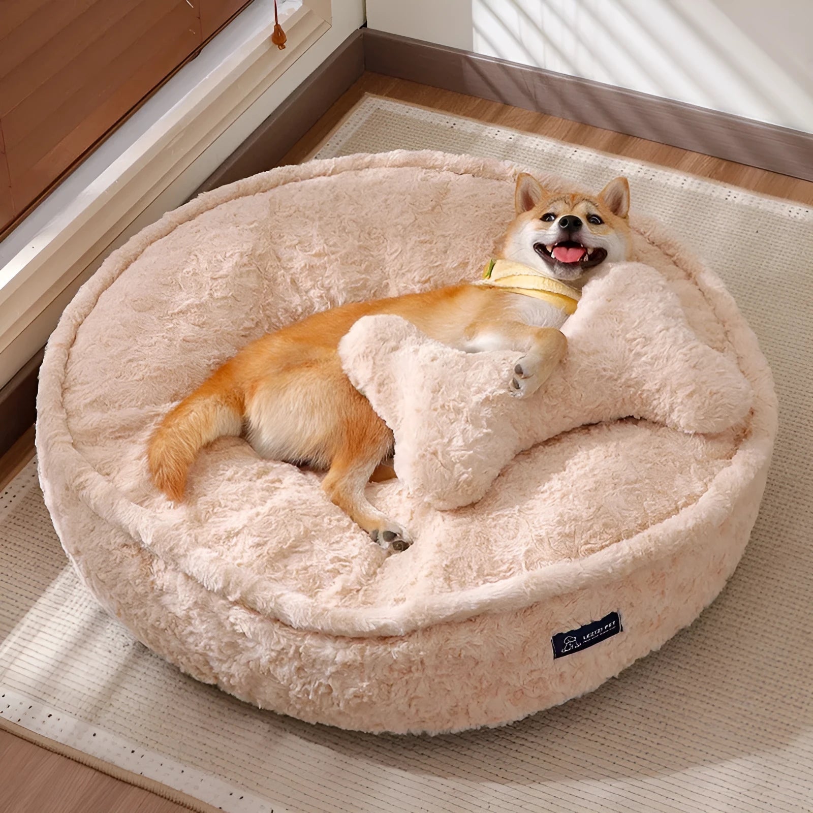 Removable washable pet bed in milk tea colour round nest design showing soft cloth construction