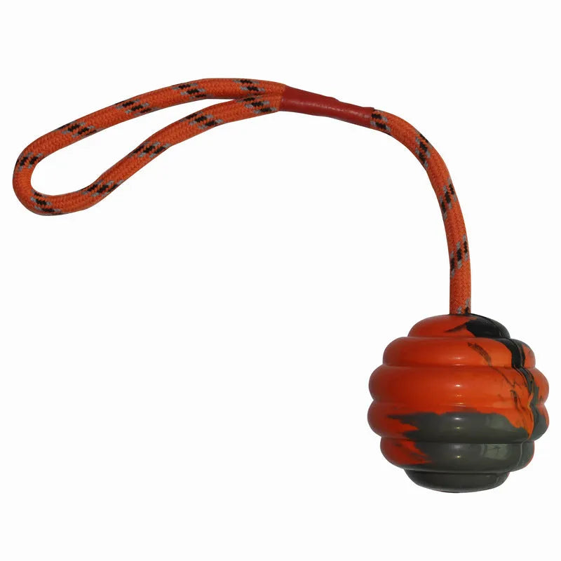 Rubber dog toy ball with rope knot in multiple colours including red, orange, yellow and blue