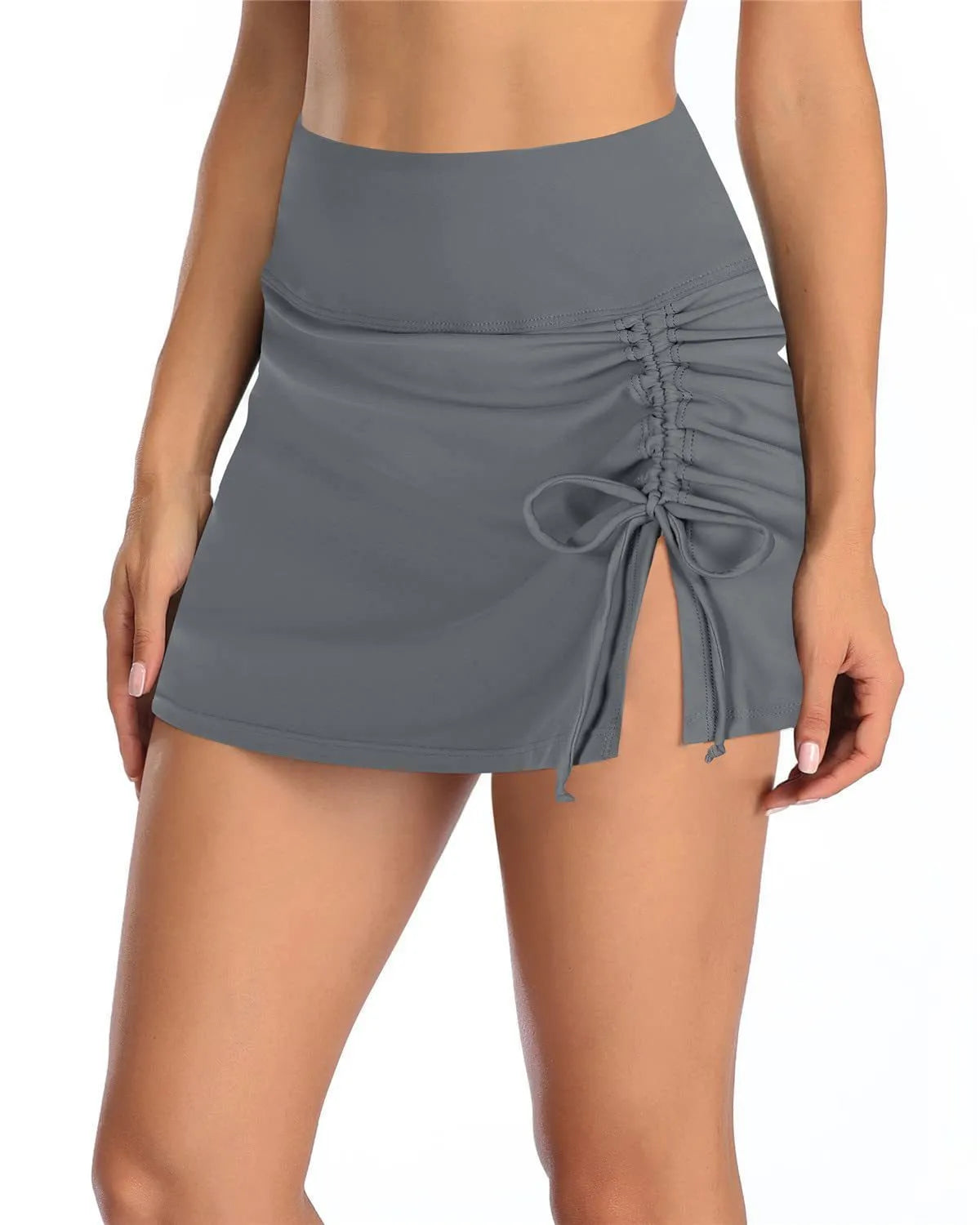 Women's solid colour lace-trimmed polyester swimming trunks in a briefs style on a white background.