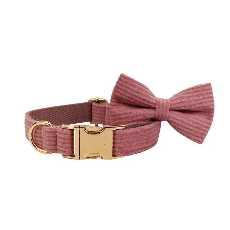 Corduroy dog collar and leash five-piece set with vest, bow, and poop bag in red.