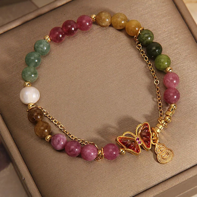 Natural jade coloured tourmaline bracelet with butterfly gourd pendant on adjustable agate bead band