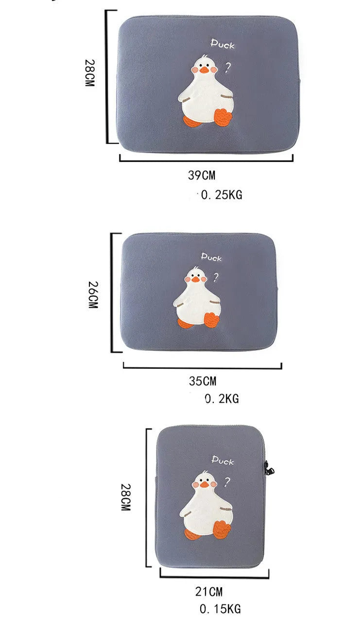 Blue cotton tablet case with embroidered cartoon duck design, showing zipper closure and protective frame.