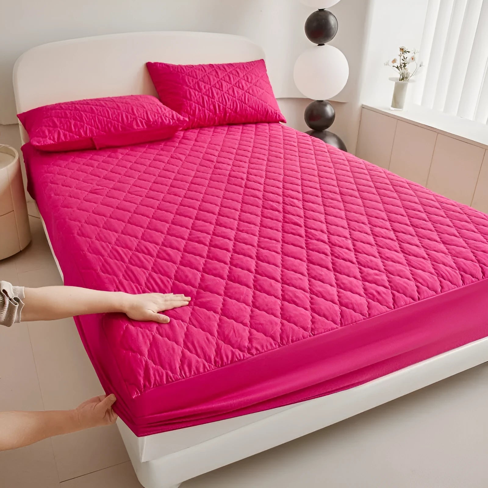 Diamond lattice quilted waterproof mattress protector set with bamboo fibre sheet and pillowcases for a 0.9m bed.