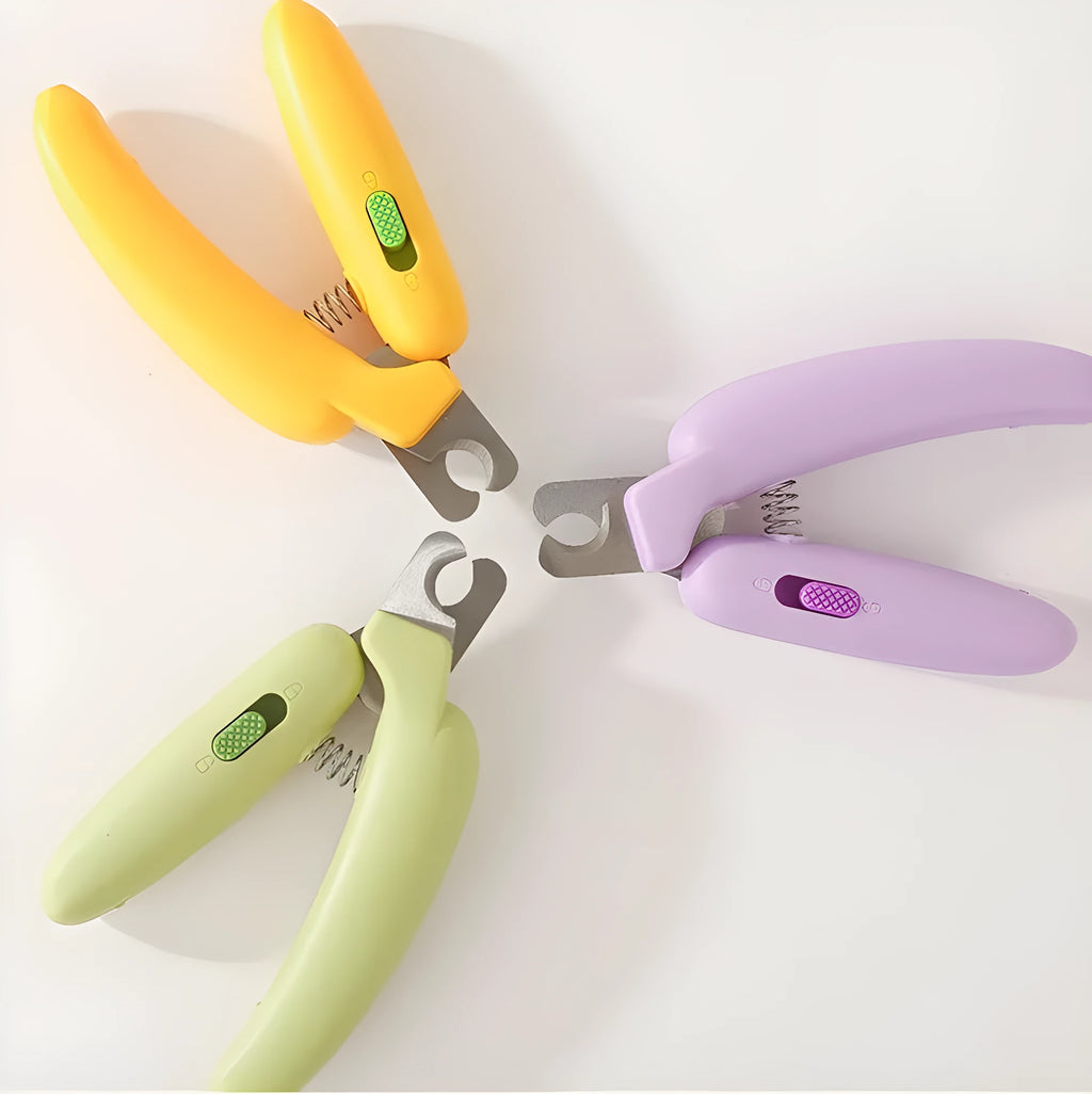 Banana-shaped pet nail clippers in green with metal blades for dog and cat grooming