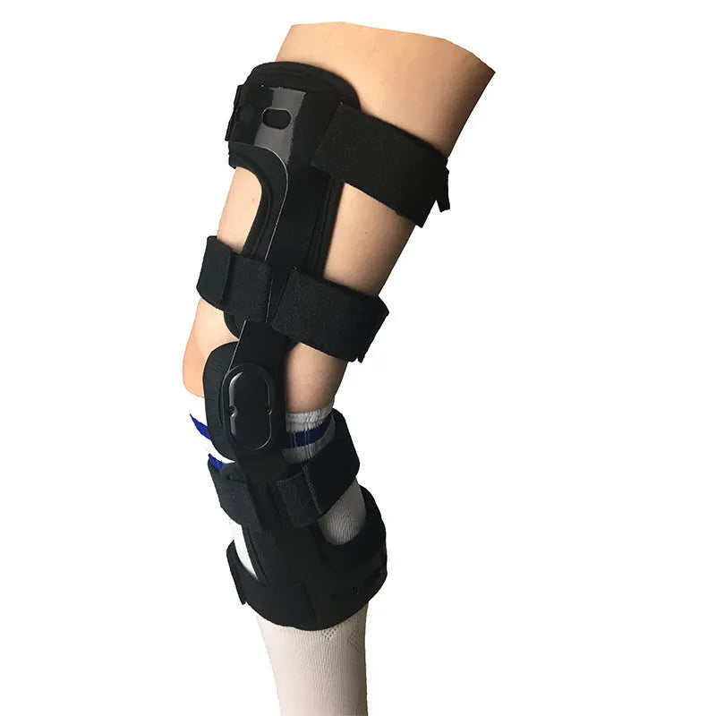Black anterior ligament knee supporter with structural framework on brushed cloth background