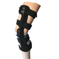 Black anterior ligament knee supporter with structural framework on brushed cloth background