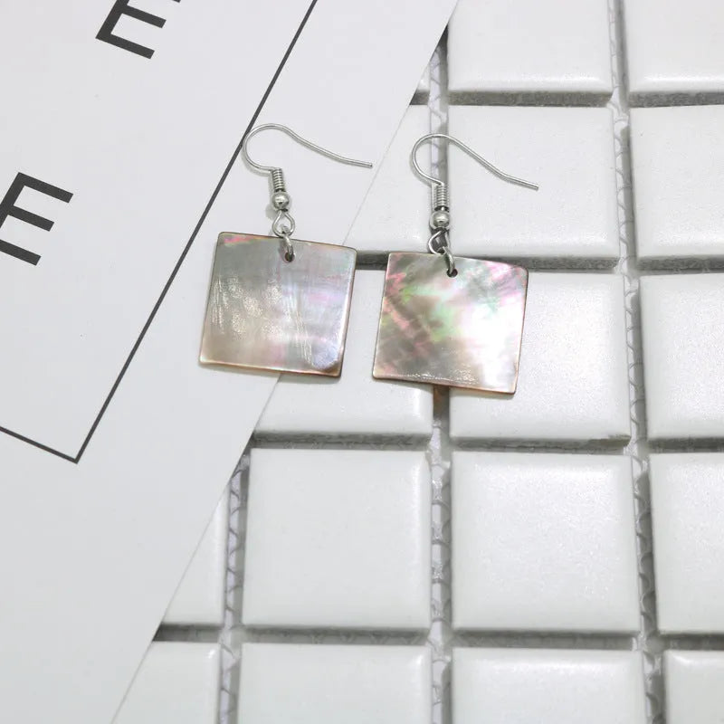 Geometric shell earrings in rectangular shell or square panther designs