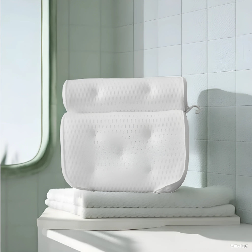 White bathtub pillow with suction cups on a 4D mesh surface.