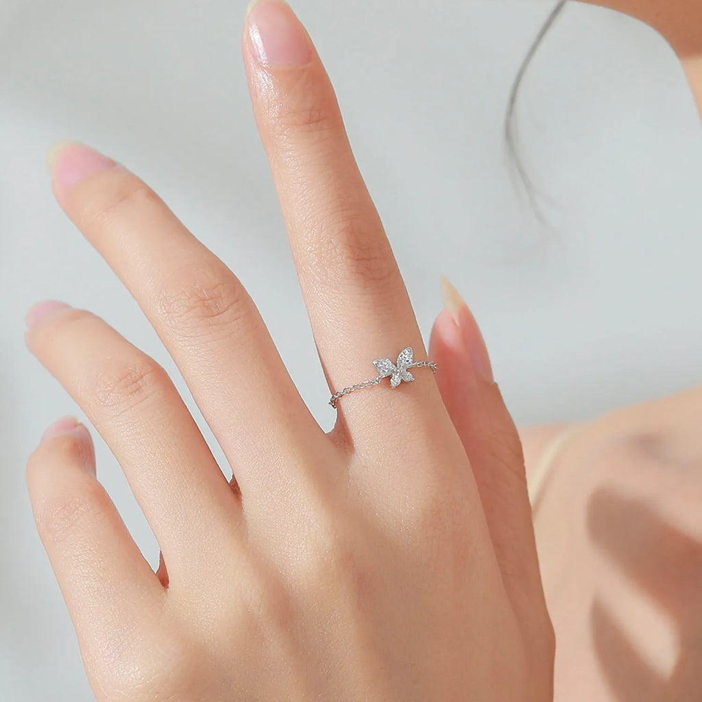 Adjustable silver ring with lively butterfly and inlaid zircon in colour JZ2049 on white background