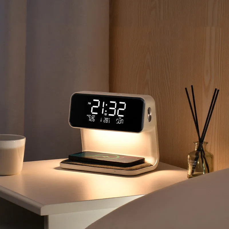 White bedside lamp with wireless charging pad and LCD clock display on base