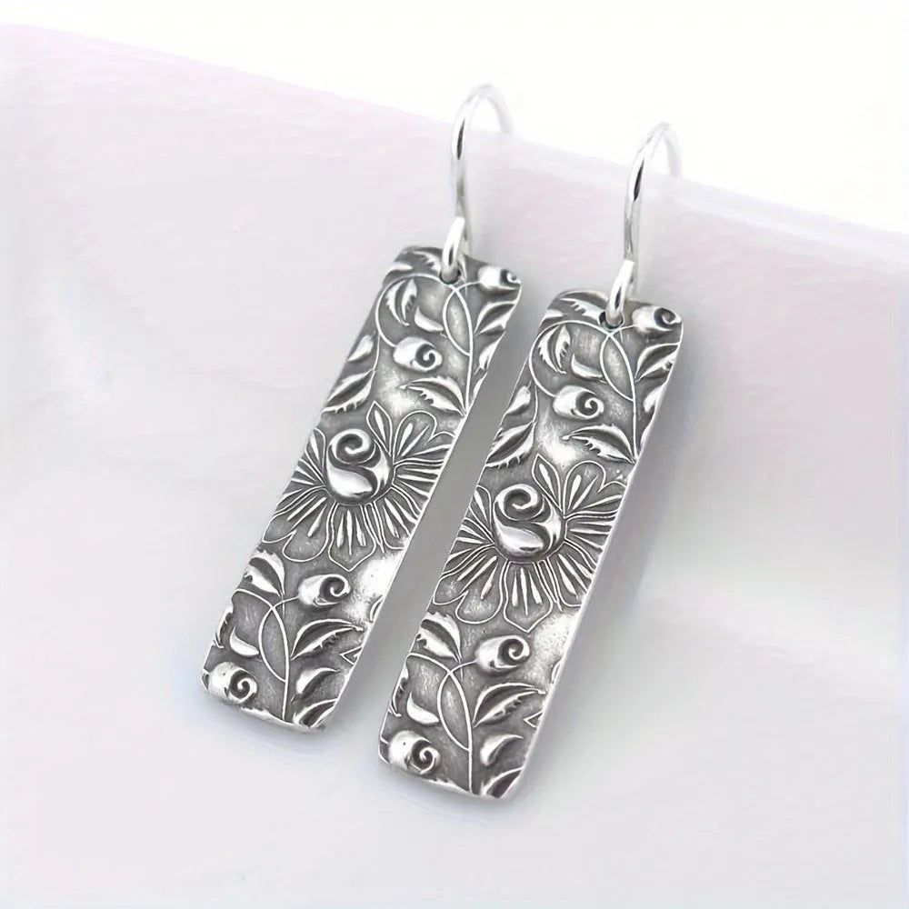 Silver geometric long earrings with carved vine design in retro European style