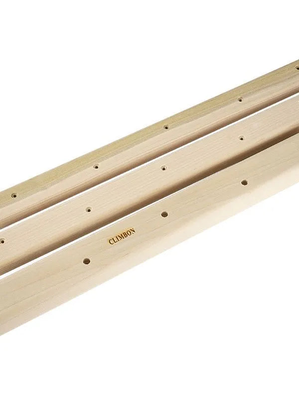 A set of three solid wooden fingerboards for grip strength training, showing different lengths and thicknesses.