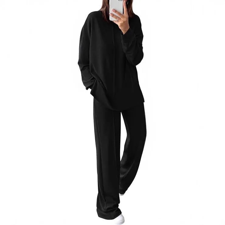 Women's long sleeve polyester jogging suit set shown in army green, available in five other colours.