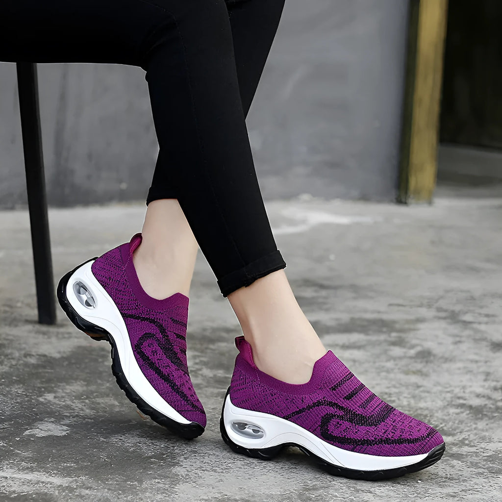 Women's low-top mesh tennis shoes with PVC air cushion soles in purple, pink, black, or grey colours