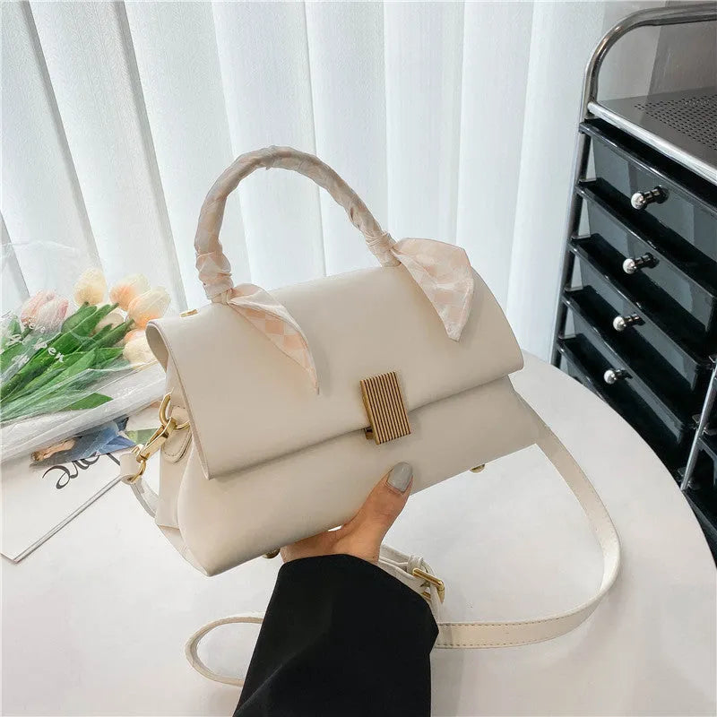 PU leather commuter shoulder handbag in horizontal square shape with organisers
